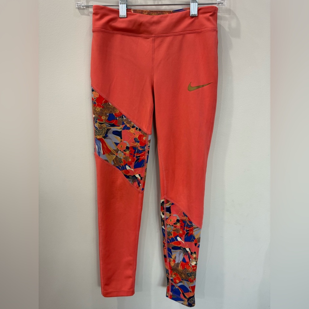 Nike kids dri fit leggings with coral and flower detail
